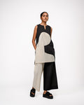OFRIDA Duality PP Pants in black and cream cotton, styled with a matching colour-block tunic