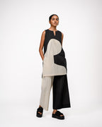 OFRIDA Duality PP Pants in black and cream cotton, styled with a matching colour-block tunic